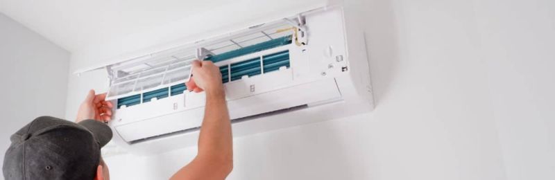 Energy efficient central air conditioner unit installed outside National City CA home